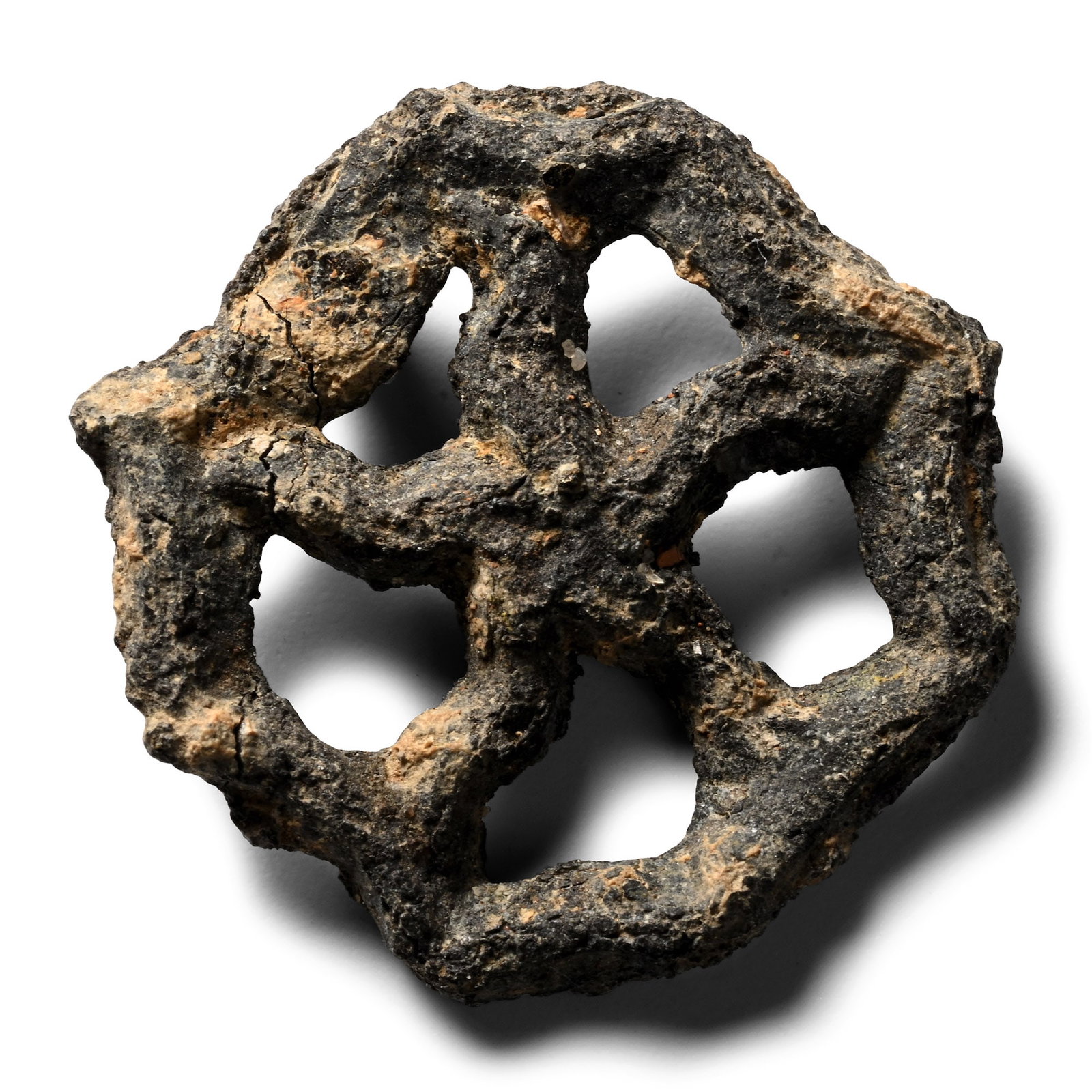 Medieval Pewter Catherine's Wheel Pilgrim's Badge: Circa 14th-15th century A.D. Openwork wheel with cranked spokes, attachment lug to reverse. Cf. Mitchiner, M., Medieval Pilgrim & Secular Badges, London, 1986, item 616, for type. 2.05 grams, 22 mm (7
