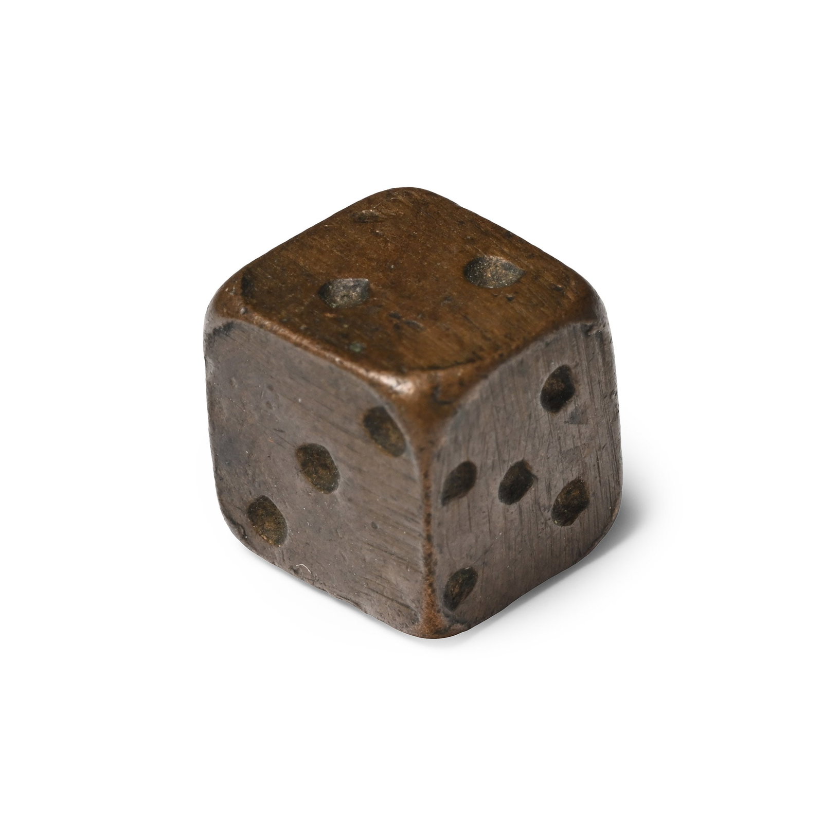 Medieval Bronze Gaming Die: Circa 14th-16th century A.D. Cuboid with punched pellet markings disposed 1:3, 2:4, 5:6. 6.64 grams, 10.02 mm (3/8 in.). [No Reserve] From the Colin Narbeth collection, 1990s. Accompanied by a previou