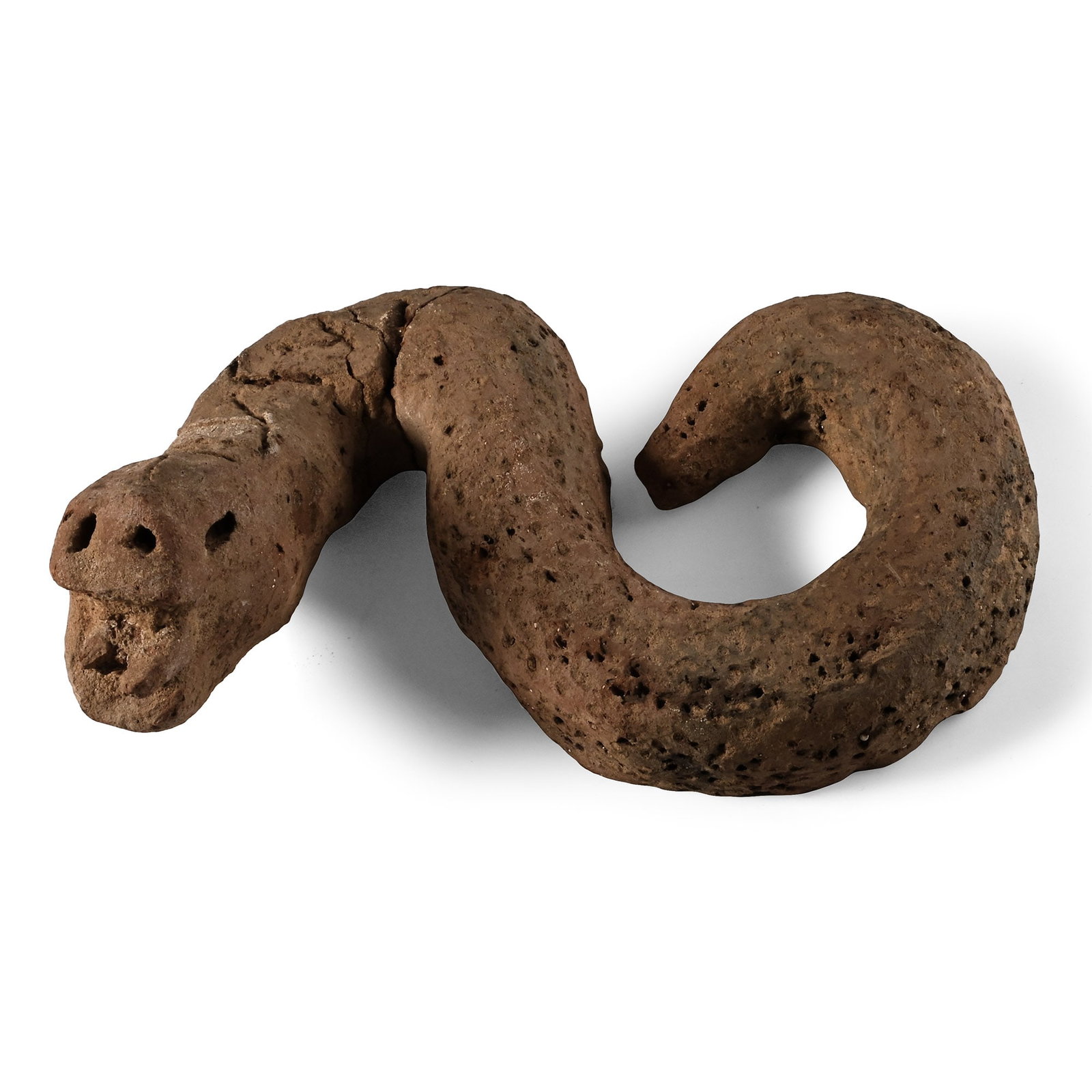 Egyptian Style Terracotta Snake: 20th century A.D. or earlier With D-section body and S-curved coils, head raised and mouth gaping to reveal a forked tongue; repaired. 456 grams, 18 cm (7 in.). [No Reserve] Acquired 1970s-1996. Prope
