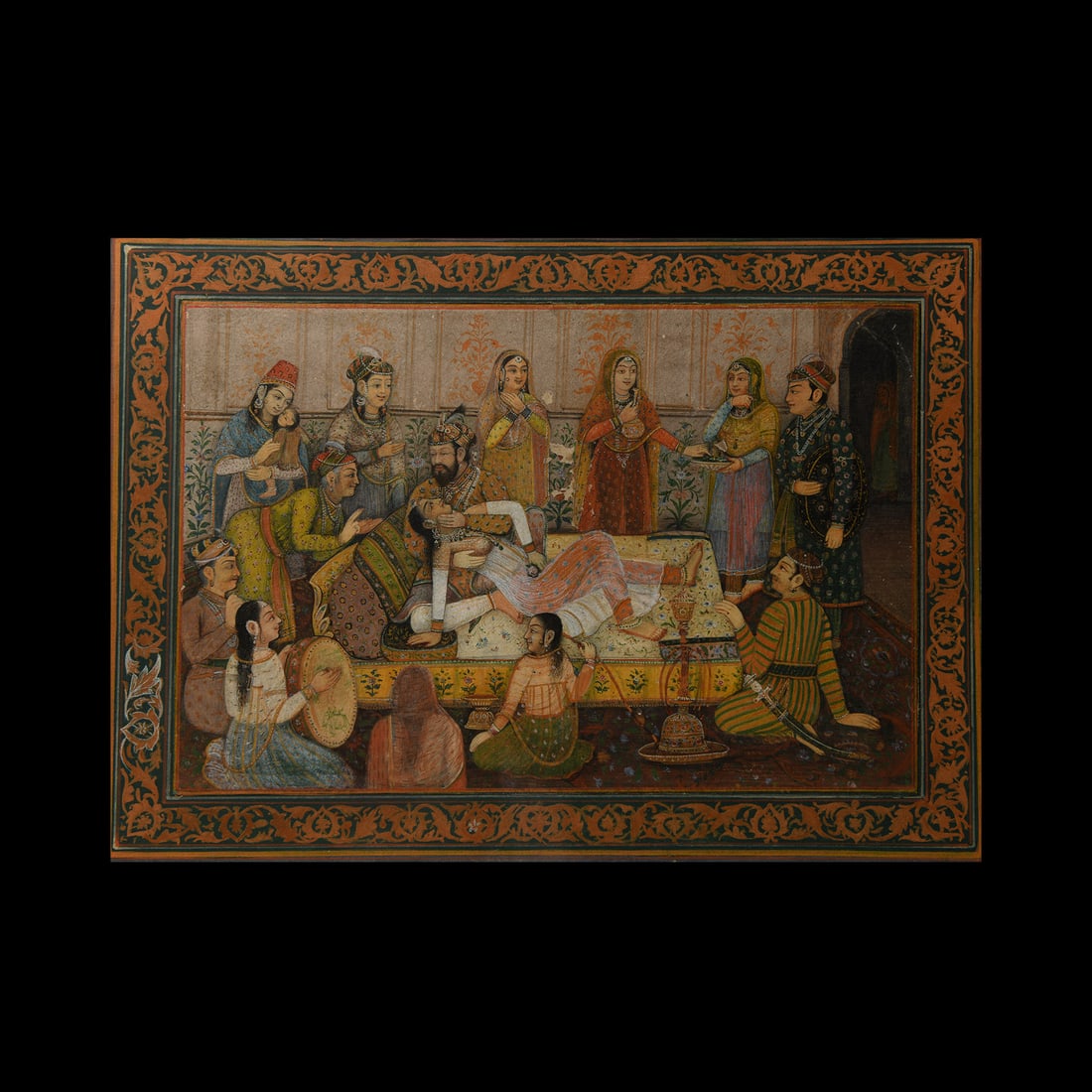 Framed Indian Watercolour Painting with Harem Scene: 20th century A.D. A watercolour painting of a group of revellers surrounding a divan with a richly-dressed couple reclining; handwritten note to the reverse reading: 'The picture shows a drinking part