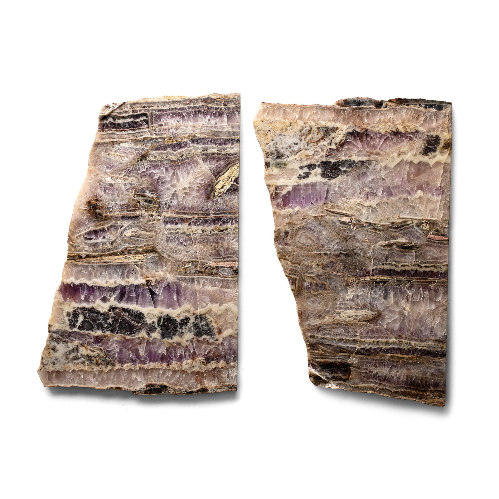 Two Large Cut and Polished Slabs of Rare Vintage Blue John Fluorite: Two irregular slabs showing typical purple, blue and white banding. 907 grams total, 25.3-25.5 cm (10 in.). [2, No Reserve] From the UK. Ex Mineral Imports, London, UK. Gregory, Bottley & Lloyd (Grego
