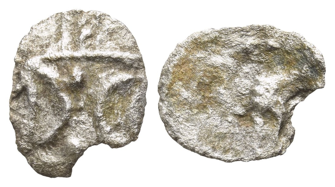 Celtic Britannia, Iceni AR Unit.: Circa AD 10-43. Ecen(?) type. Two opposed crescents with pellets between, superimposed upon band of three lines / Horse advancing to right. Cf. ABC 1678 & 1681; cf. SCBC 436. 0.48gr, 14mm, 3h. Acquire