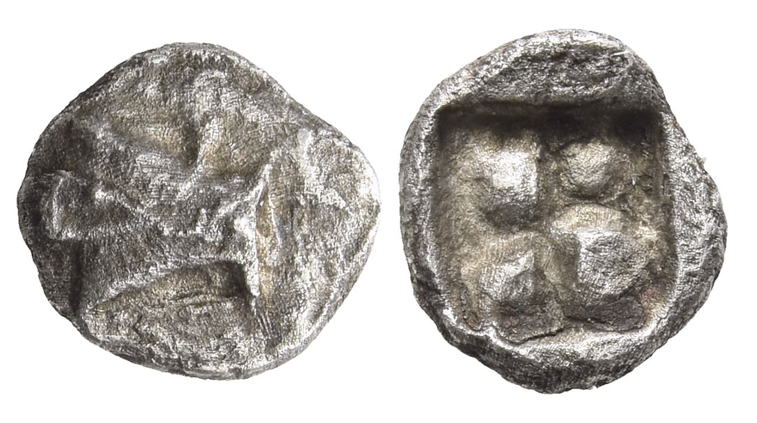 Mysia, Kyzikos AR Obol.: Circa 600-525 BC. Head of tunny to right, superimposed on head of bull to right / Quadripartite incuse square. For a similar example cf. CNG 88, 290, otherwise unpublished. 0.72gr, 9mm, 12h. From the 
