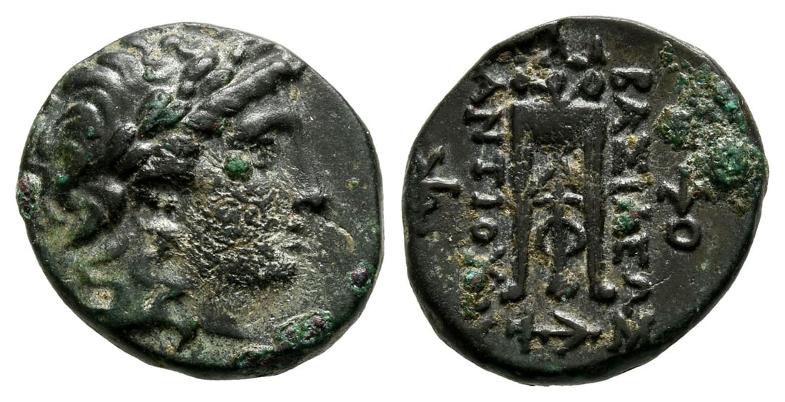 Seleukid Empire, Antiochos II Theos AE 18mm.: 261-246 BC. Uncertain mint, possibly Tralleis. Laureate head of Apollo to right / BA?????? ANTIOXOY, tripod; monogram of ??? to outer left and monogram of OYI to outer right; below, anchor to right. S
