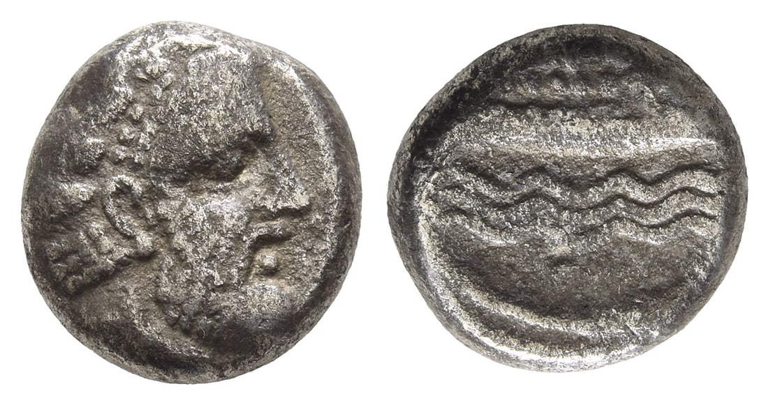 Phoenicia, Arados AR 1/3 Stater.: Circa 380-351/0 BC. Laureate head of Melkart to right / Galley over waves. Cf. Betlyon 26 (Stater). 3.08gr, 12mm, 9h. From the collection of a gentleman, acquired on the London art market in the 1990s