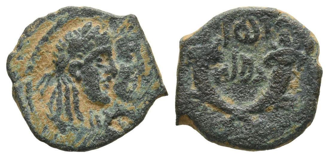 Nabataea, Rabbel II, with Gamilat AE 20mm.: Struck circa AD 88/9-106/6. Petra mint. Jugate laureate and draped busts of Rabbel and Gamilat to right / Crossed cornucopiae; legend in Aramaic between and below. CN 235; Meshorer, Nabataea 163. 3.94