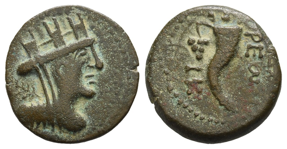 Decapolis, Gadara AE 20mm.: Dated year 20 of the Pompeian Era (45/4 BC). Turreted, veiled, and draped bust of Tyche to right, palm frond over shoulder / ????-????, cornucopia; L K (date) to inner left. Spijkerman 5; Rosenberger 