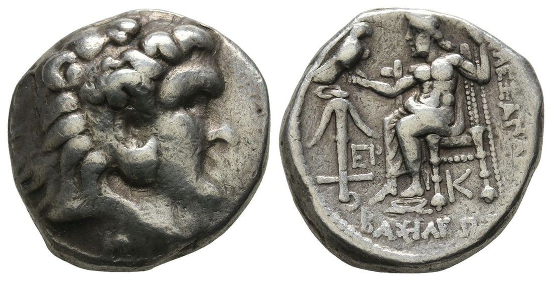 Seleukid Empire, Seleukos I Nikator, second satrapy and kingship AR Tetradrachm.: Struck circa 311-308/5 BC. Uncertain mint 6A, in Bablyonia. In the name and types of Alexander III of Macedon. Head of Herakles to right, wearing lion skin headdress, paws tied beneath chin / ???I????