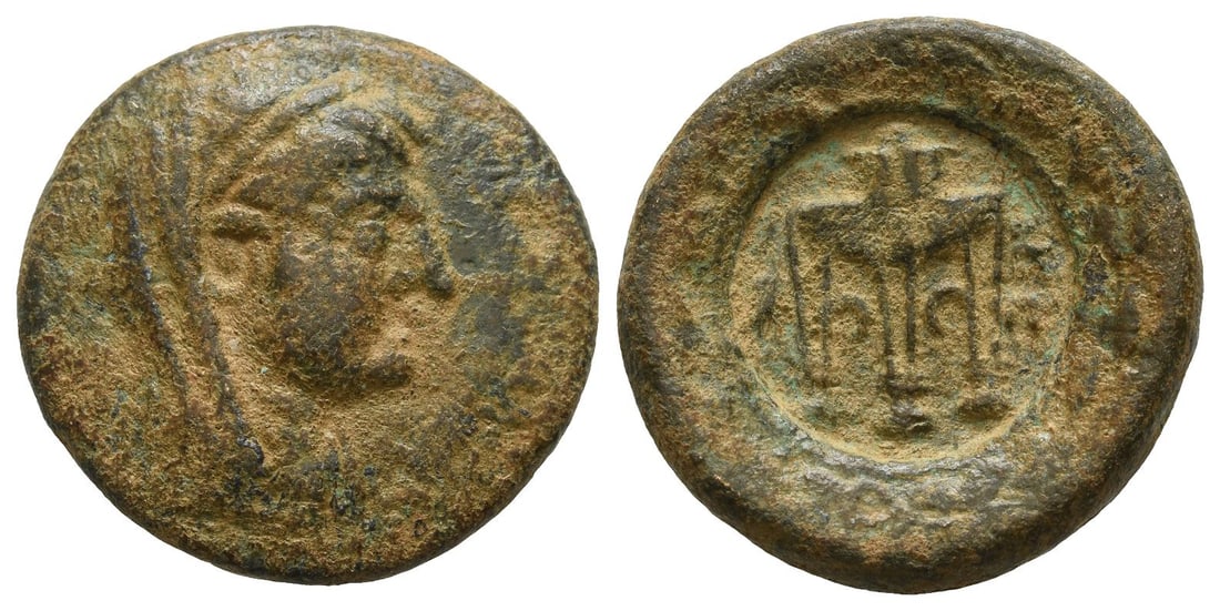 Uncertain Greek AE 27mm.: After circa 2nd century BC. Female veiled head to right / Big circular countermark containing tripod, TE(?) to right, bird to left. 13.92gr, 27mm, 12h. From the collection of a gentleman, acquired on 