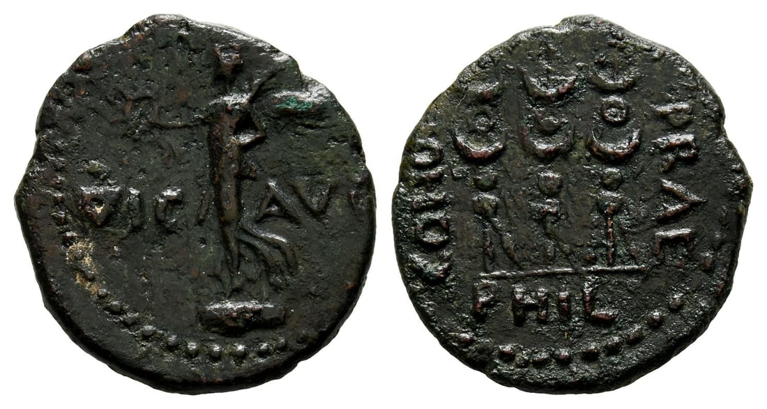 Macedon, Philippi AE 21mm.: Time of Claudius to Nero, circa AD 48-61. Pseudo-autonomous issue. Victory standing to left on base, holding wreath and palm; VIC AVG across fields / COHOR PRAE PHIL, three standards. RPC I, 1651; BMC
