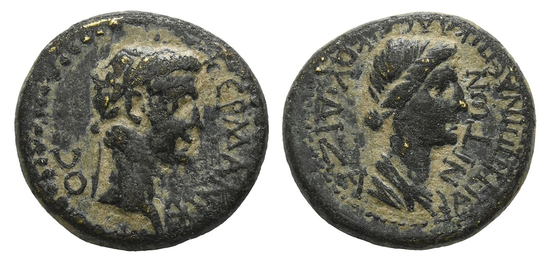 Divus Germanicus with Diva Agrippina Senior AE Hemiassarion or Half Assarion of Aezanis, Phrygia.: Struck under Gaius, AD 37-41. (Lollios Klassikos), magistrate. , laureate head of Germanicus to right / , draped bust of Agrippina Senior to right. RPC I, 3081; SNG Copenhagen 71. 3.83gr, 17mm, 1h. Ac