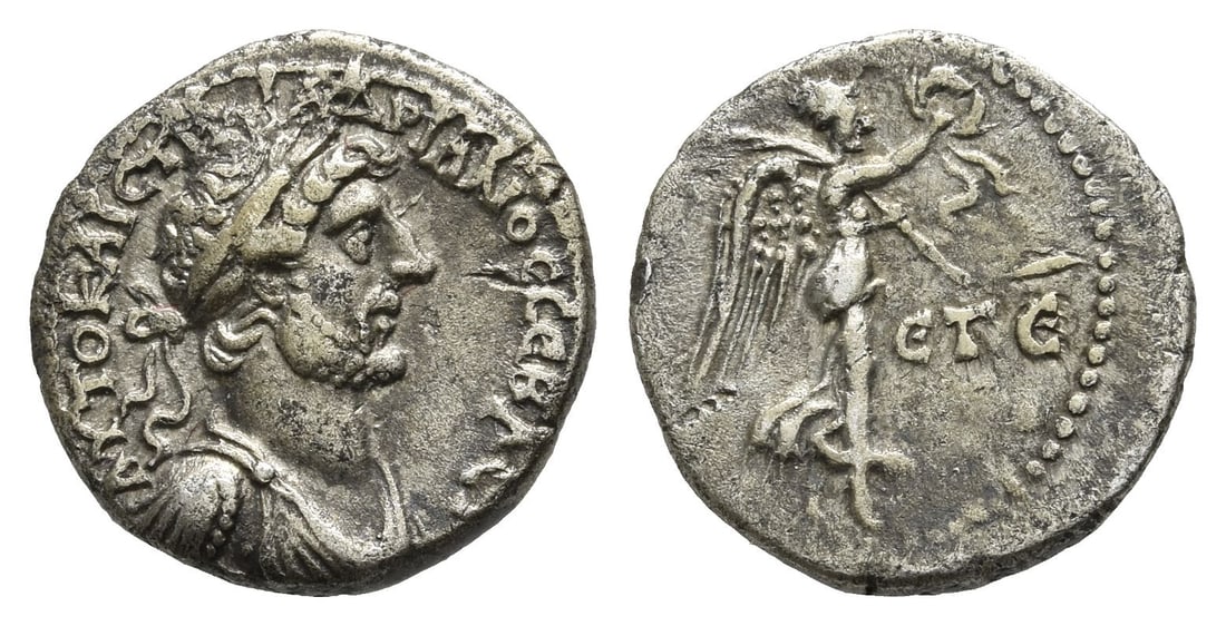 Hadrian AR Hemidrachm of Caesarea-Eusebeia, Cappadocia.: Dated RY 5 (AD 120/1). laureate, draped and cuirassed bust to right / Nike advancing to right, holding wreath and palm; ET E (date) in right field. RPC II, 3076; Sydenham, Caesarea 260. 1.83gr, 14mm, 