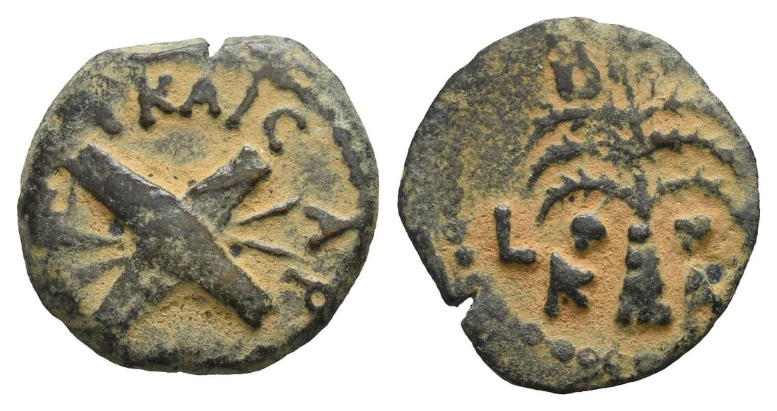 Judaea. Procurators, Antonius Felix AE Prutah.: Dated RY 14 of Claudius (CE 54). Jerusalem mint. In the name of Nero Claudius Caesar and Britannicus. [NEP? K?AY] KAICAP, two crossed shields over two crossed spears / B[PIT] above, K-A[I] and L [I?] 