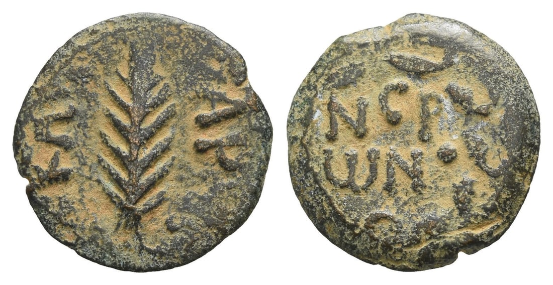 Judaea. Procurators, Porcius Festus AE Prutah.: Dated RY 5 of Nero (58/9 CE). Jerusalem mint. In the name of Nero. [L ?] KA[IC]-AP[OC], palm branch / N?P?N•C in three lines within wreath. RPC I, 4972; TJC 345; Hendin GBC 6, 6380; Hendin GBC 5,