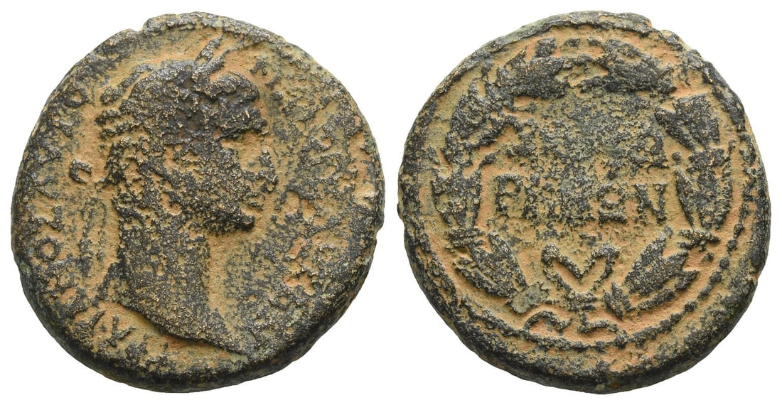 Trajan AE 26mm of Sepphoris, Judaea.: AD 98-117. laureate head to right / in two lines within wreath. RPC III, 3936; BMC 1; De Saulcy 1; Rosenberger 3; Sofaer 1. 14.85gr, 26mm, 12h. From the collection of a gentleman, acquired on the Lond