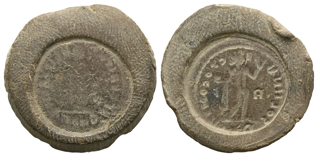 Roman Imperial, Constantine I Terracotta Forger's Casting Mould.: 4th century AD. Incuse of uncertain deity standing to right and holding object / Incuse of SOLI INVICTO COMITI, Sol standing to left, raising hand and holding globe; R-F across fields, R(star)T in exe