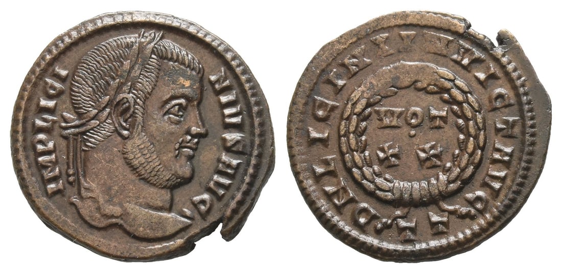 Licinius I BI Nummus.: AD 320-321. Ticinum mint. 3rd officina. IMP LICINIVS AVG, laureate head to right / D N LICINI INVICT AVG, VOT • XX within wreath; T T in exergue. RIC VII 146. 3.06gr, 19mm, 7h. From an early 20th