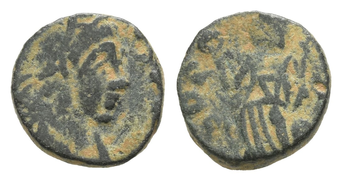 Avitus(?) AE Nummus.: AD 455-456. Rome mint. Diademed, draped and cuirassed bust to right / Victory advancing to left, holding wreath and palm frond. Cf. RIC 2413. 1.41gr, 11mm, 12h. From the collection of a gentleman, acq