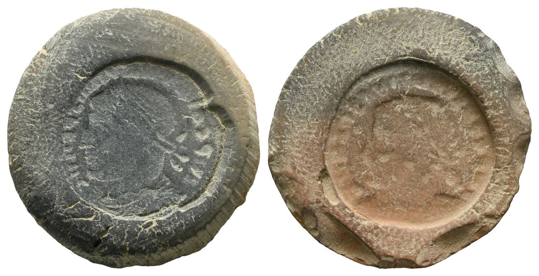 Roman Imperial, Terracotta Forger's Casting Mould.: 4th century AD. Incuse of IMP CO[..] P F AVG(?), laureate, draped and cuirassed bust to right / Incuse of laureate head (or bust) to right. 3.97gr, 26mm, 5h. From the collection of a gentleman, acquir