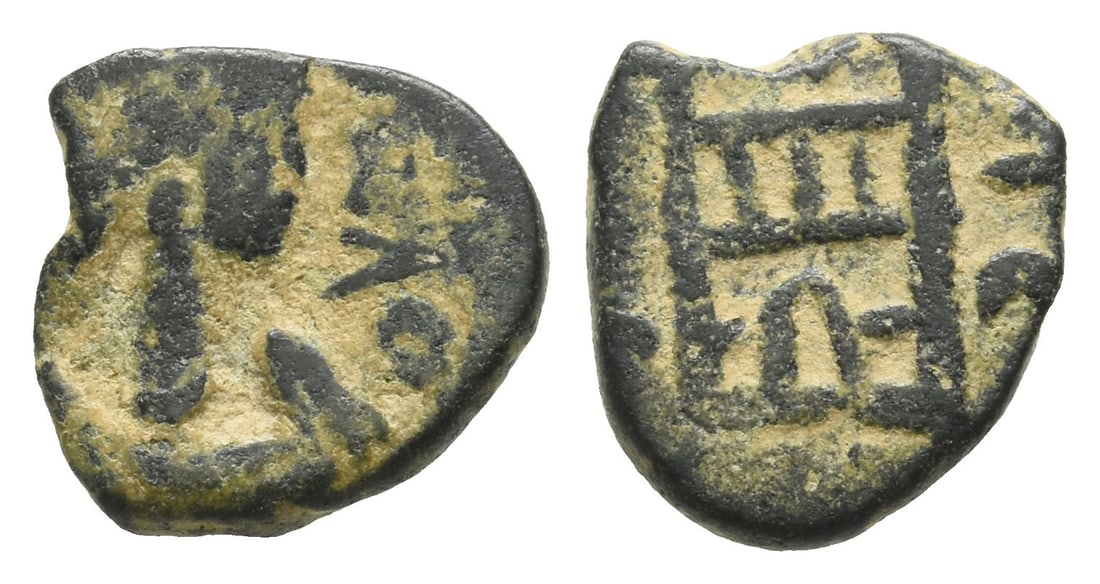 Vandals, Imitative AE 12mm.: Circa 5th century AD. Pearl-diademed, draped and cuirassed bust to right / Camp gate with open doorway. For similar, cf. BMC Vandals 73-80 (in the name of Valentinian III); for prototype, cf. RIC X 21