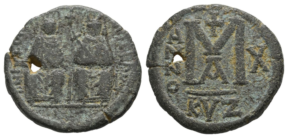 Justin II, with Sophia AE 40 Nummi or Follis.: Dated RY 10 (AD 574/5). Uncertain military mint. Nimbate imperial couple seated facing on double throne / Large M; ANNO to left; X (date) to right, cross above, A below, KYZ in exergue. MIBE 90b; DOC 