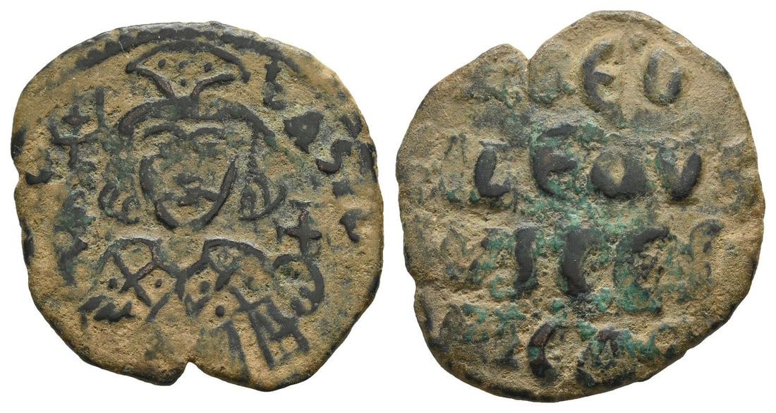 Theophilus AE Follis.: Struck AD 830/1-842. Uncertain provincial mint. [??OFIL] ?ASIL', half-length facing figure of Theophilus, wearing loros and tufa decorated with pellets, holding labarum and globus cruciger / + ??OFIL?