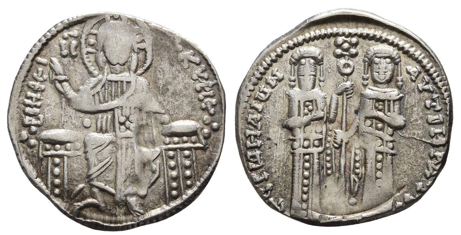 Andronicus II Palaeologus, with Michael IX AR Basilikon.: Struck 1304-1320 (or later). Constantinople mint. Christ Pantokrator enthroned facing, raising hand in benediction and holding Gospels / Andronicus II and Michael IX standing facing, together holding 