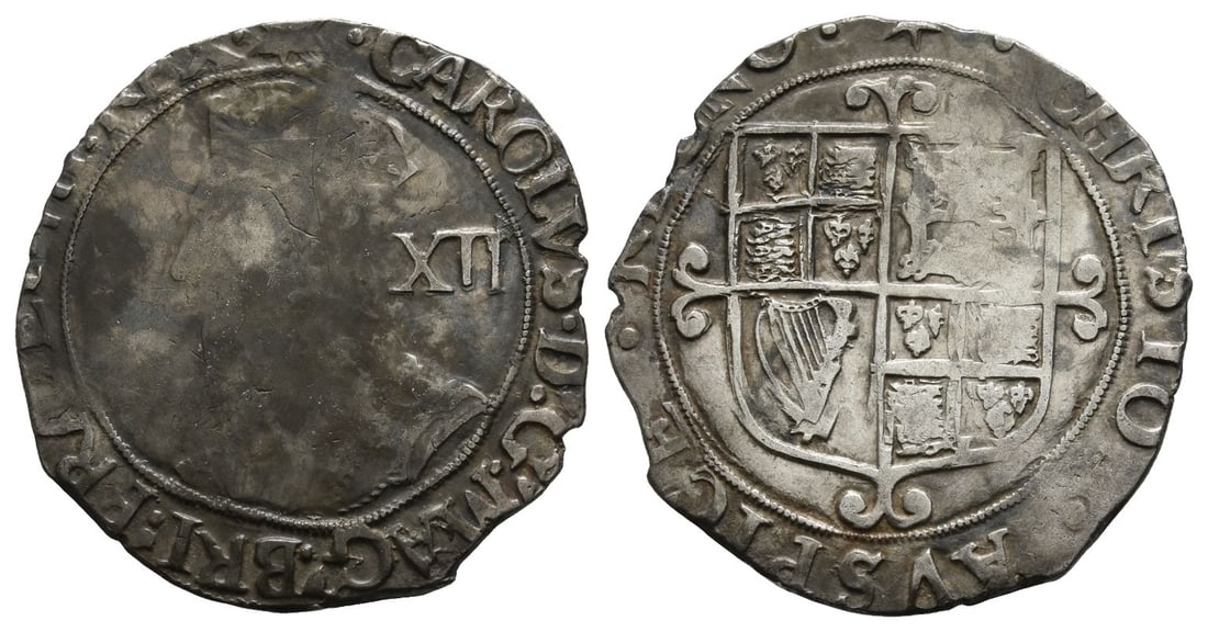 England. Stuart, Charles I AR Shilling.: Struck 1640-1641. Tower (under the King) mint; i.m: star. Group F; sixth large 'Briot's bust', type 4.4. (Star) · CAROLVS D G MAG BRI FRA · ET · HI .' REX ·, crowned sixth bust to left, wearing ru