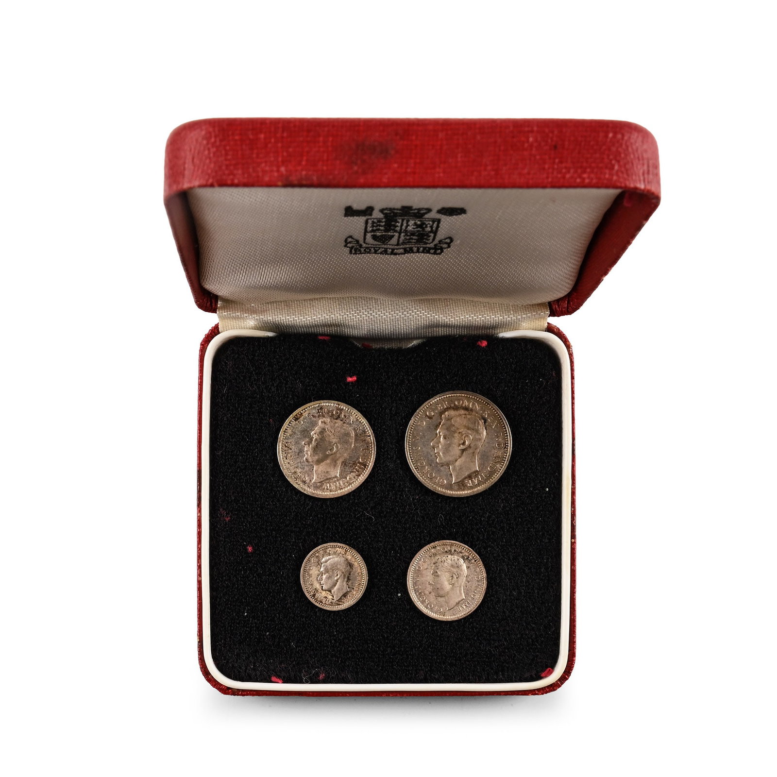 Great Britain. Windsor, George VI AR Maundy Money Set.: Dated 1945. Comprising: Set of Four, Three, Two and One Penny denominations in a Maundy coin box. SCBC 4086. 53.75gr total. From the private coin collection of a West London, UK, gentleman, formed sin