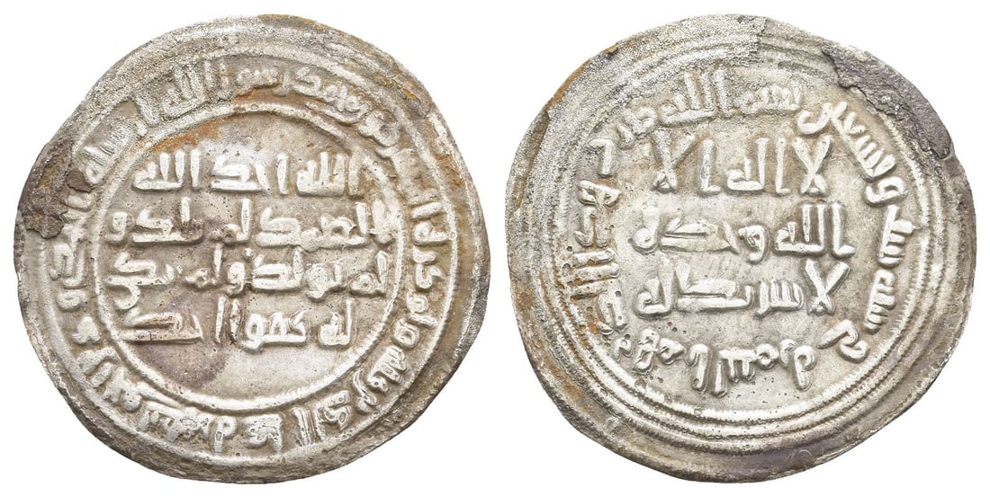 Umayyad Caliphate AR Dirham.: Dated AH 96 (AD 714/5). Al-Taymara mint. Standard Umayyad Shahadah at the centre with marginal stating mint and year / Umayyad Symbol (Quran 112) in four lines across fields; Second Symbol (Quran 9.33