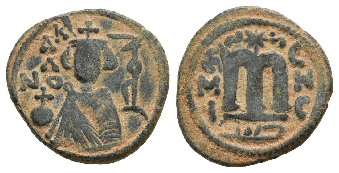Umayyad Caliphate, time of Mu'awiya I ibn Abi Sufyan AE Fals.: AH 41-60 (AD 661-680). Hims (Emesa) mint. Arab-Byzantine type. Crowned imperial bust facing, holding globus cruciger; KA?ON ('good') in Greek downwards to left, bi-hims ('in Hims') in Kufic to right /