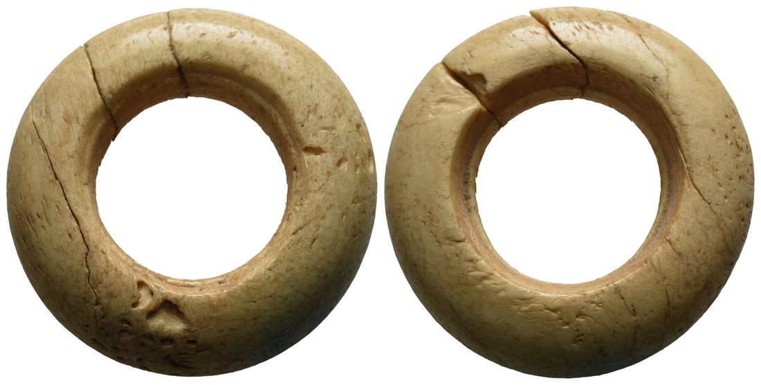 Large Levante Bone Weight of Uncertain Standard.: Circa 750-300 BC. Bone ring with wide hole. For a similar example see British Museum 1969,0401.120. 17.16gr, 42mm, 12h. Found Hebron in 1971. From the Gabby family collection, 1960s-1970s. TimeLine Au
