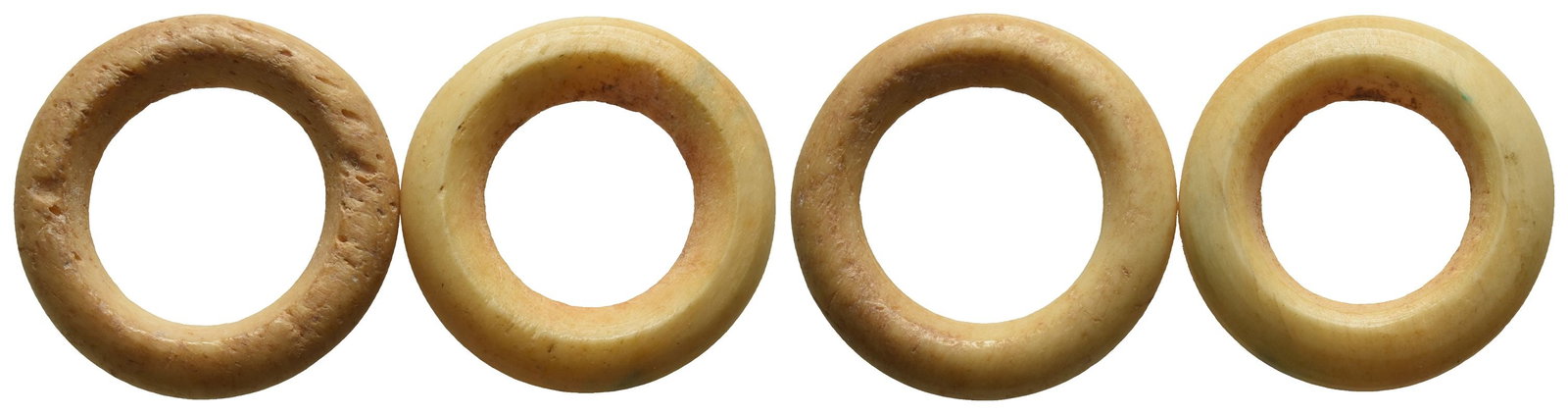 Group of Two [2] Levante Bone Weight of Uncertain Standard.: Circa 750-300 BC. Bone rings with wide holes. For a similar example see British Museum 1969,0401.120. 2.77gr total, 20-21mm, 12h. Found Hebron in 1971. From the Gabby family collection, 1960s-1970s. T