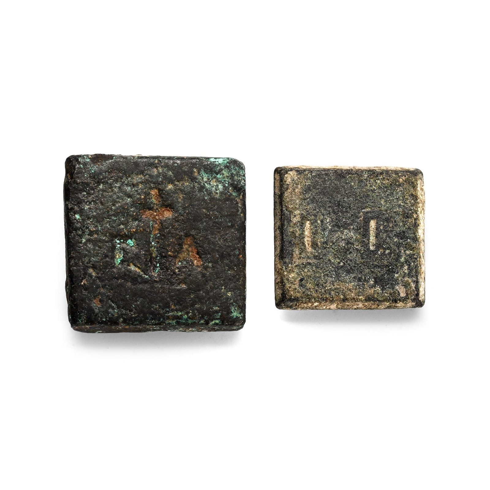 Group of Two [2] Byzantine AE Weights.: 4th-6th century AD. Various standards. 35.55gr total. [No Reserve] From the collection of a gentleman, acquired on the London art market in the 1990s. TimeLine Auctions follows a rigorous vetting proc