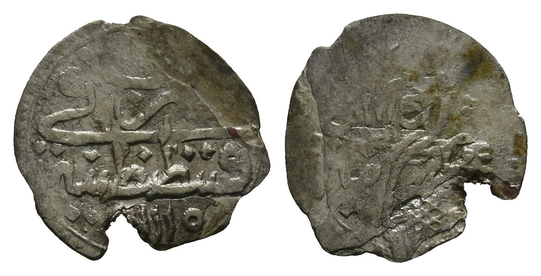 Ottoman Empire. Ahmed III AR Para.: Dated AH 1115 (AD 1704) Qustantinya (Constantinople) mint. Toughra / Mint and date. KM 139.1. 0.36gr, 14mm, 12h. Property of a North London, UK, gentleman. TimeLine Auctions follows a rigorous