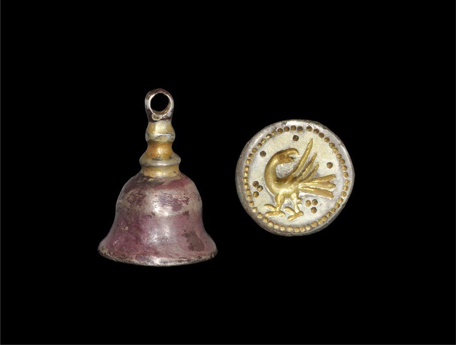 Post Medieval Silver-Gilt Seal Matrix Weight: 17th century AD. A silver-gilt bell-shaped weight with suspension loop above; the stamp design a regardant standing bird with pellets; possibly of Indian origin, the profile reminiscent of a stupa. 9.
