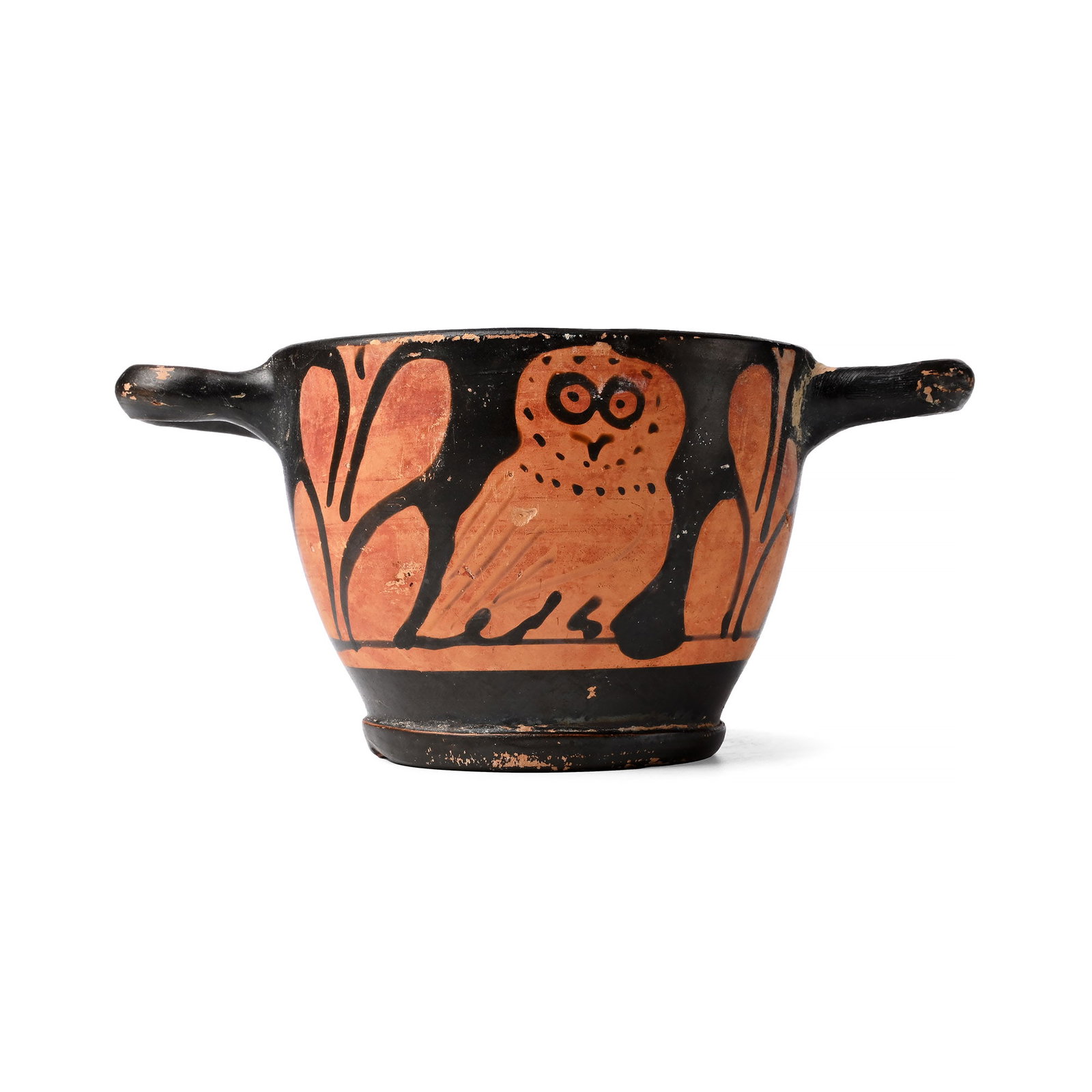 Greek Red-Figure Skyphos with Owl: Attic, 5th-4th century B.C. Mammiform body with flared pedestal base and two loop handles to the rim; each side with a facing image of an owl between laurel fronds; concentric circles to the base, Att