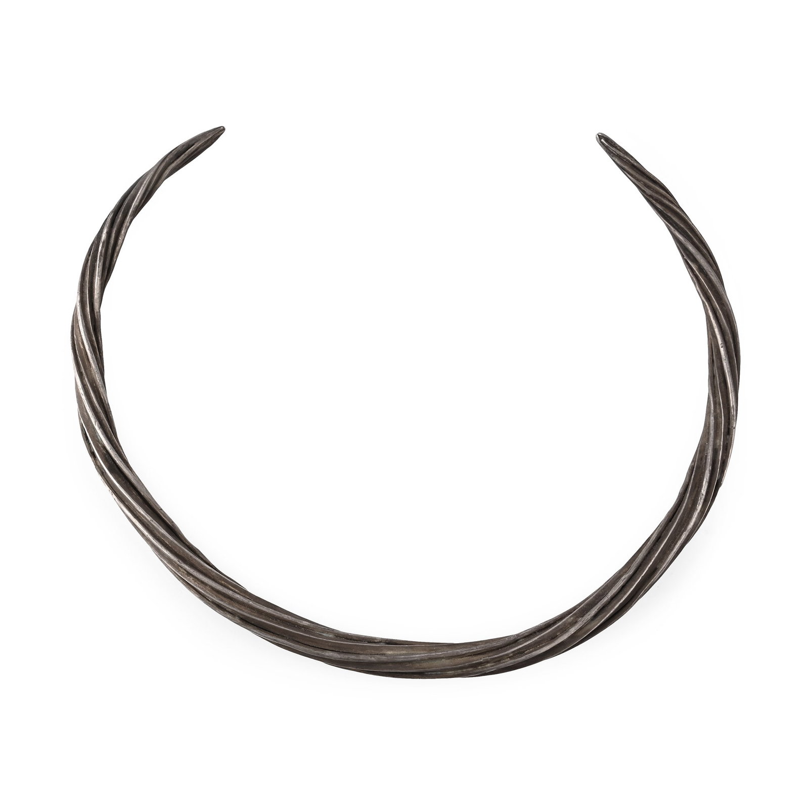 Thracian Silver Twisted Torc: 5th century B.C. Penannular torc twisted around its axis with tapering finials. See Hoddinott, R.F., The Thracians, London, 1981, for dicussion. 221 grams, 19.7 cm (7 3/4 in.). Acquired in the early 1