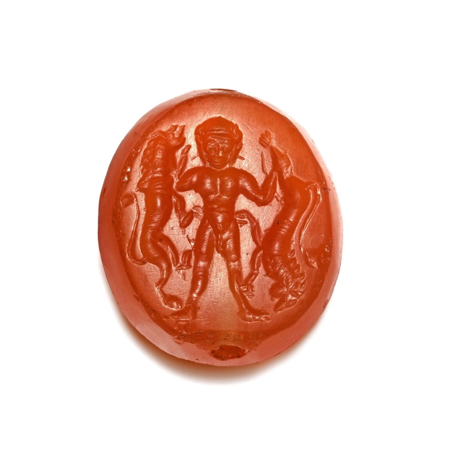Eastern Greek Carnelian Scaraboid Gemstone with Nude Hero Holding Lions: 6th-5th century B.C. or later. Scaraboid type with incuse design to the underside of a nude hero facing, holding one lion by the neck and another by the hind leg; supplied with a museum-quality impres