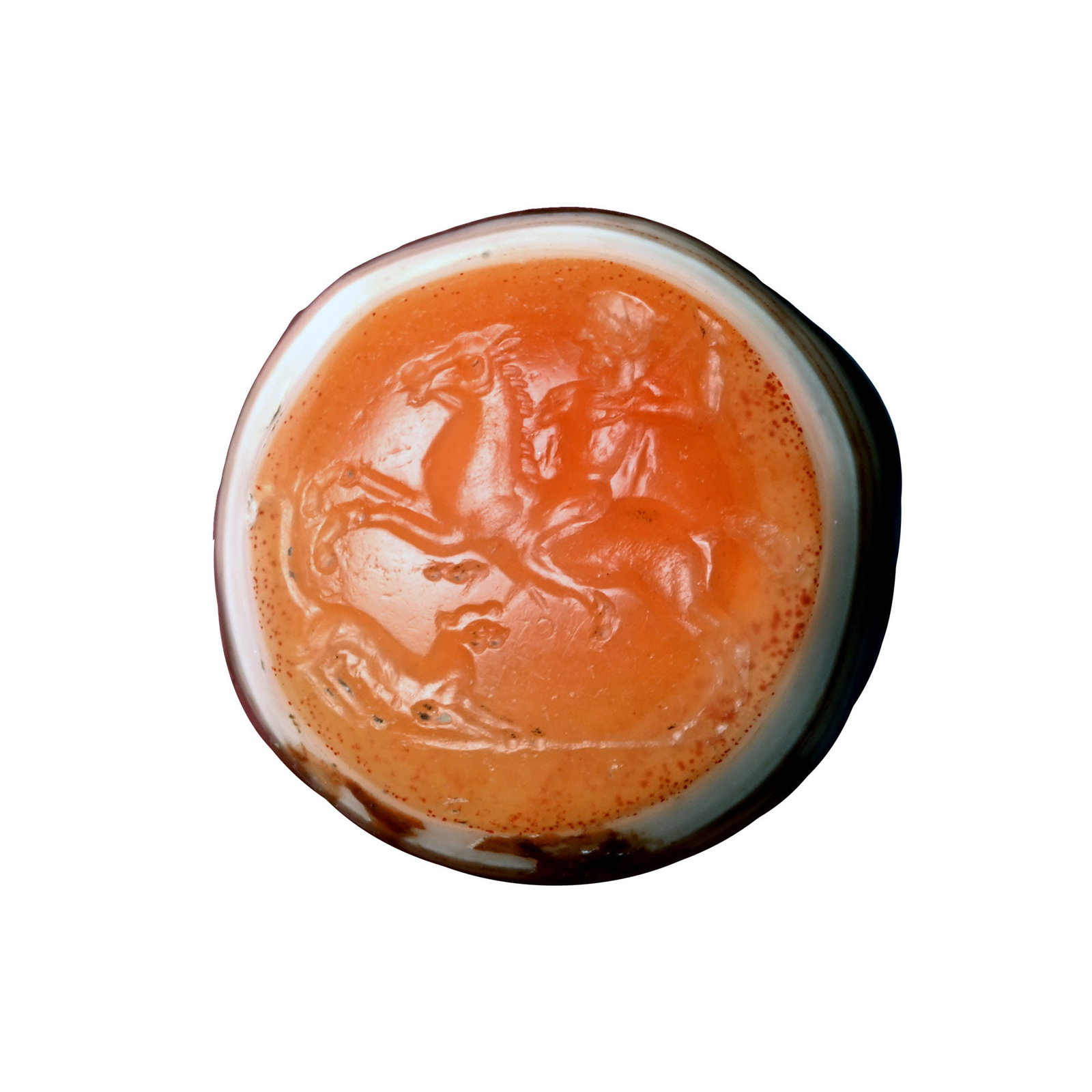 Greek Carnelian Onyx Gemstone with Horseman: 1st century B.C. Plano-convex 'eye' type with incuse design to the upper face of a huntsman on a rearing horse attacking a lion; supplied with a museum-quality impression. 4.14 grams, 17 mm (5/8 in.).