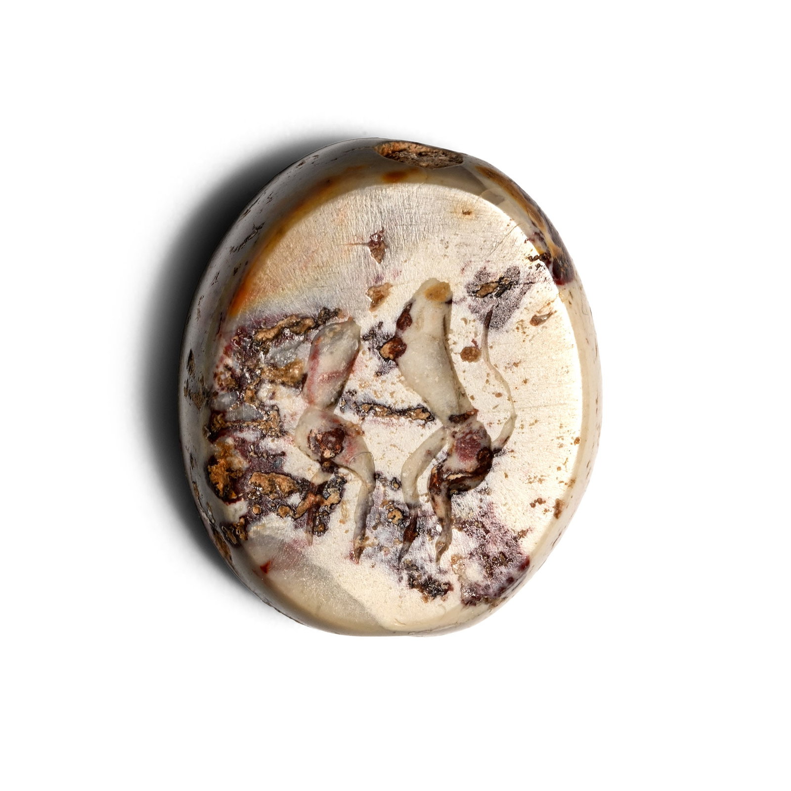 Etruscan Variegated Agate Scaraboid Gemstone with Dancing Satyrs: 4th century B.C. Scaraboid type with incuse design to the underside of two opposed dancing satyrs, heads and arms missing, possibly unfinished or cut down from a depiction of a lion and hero; supplied