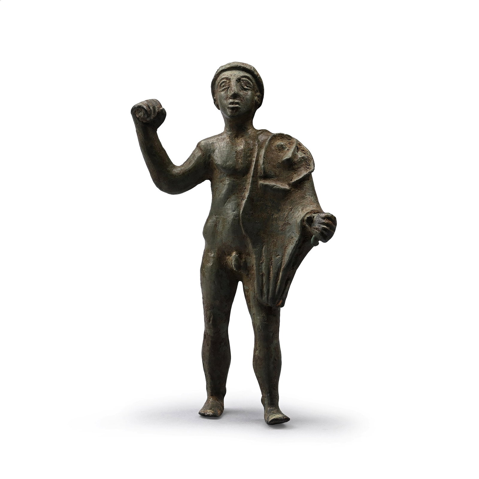 Etrusco-Italic Bronze Figure of Young Hercules: Archaic Style, circa 4th-3rd century B.C. Modelled in the round figure standing in advancing pose with the right hand raised and fist clenched; left shoulder and arm covered with the skin of the Nemea