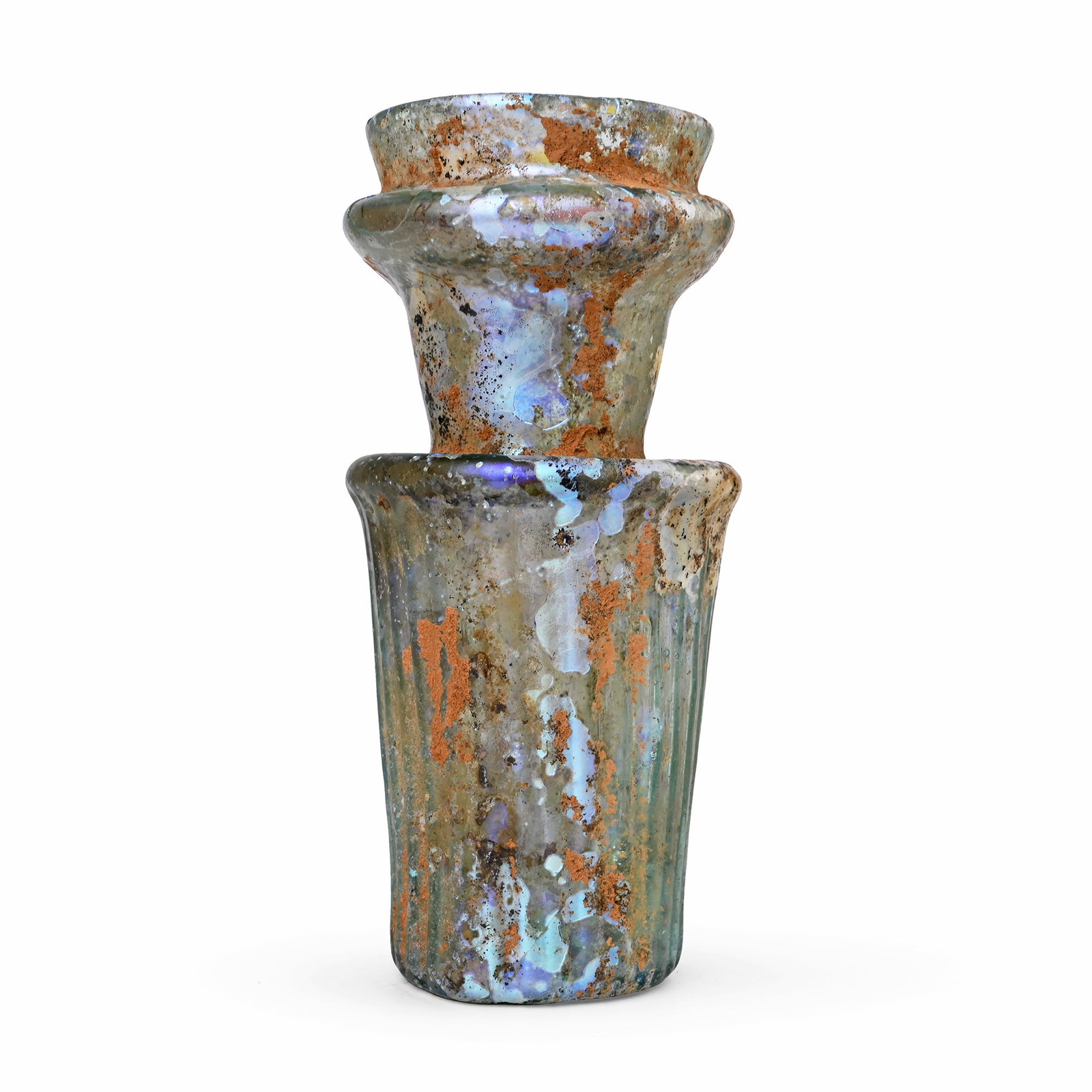 Roman Ribbed Glass Vessel: 3rd century A.D. The body with fine ribs and a dimpled base, a carinated shoulder and a funicular neck with a raised collar below the rim. Cf. for a similar example Filarska, B., Szkla Starozytne (Anc