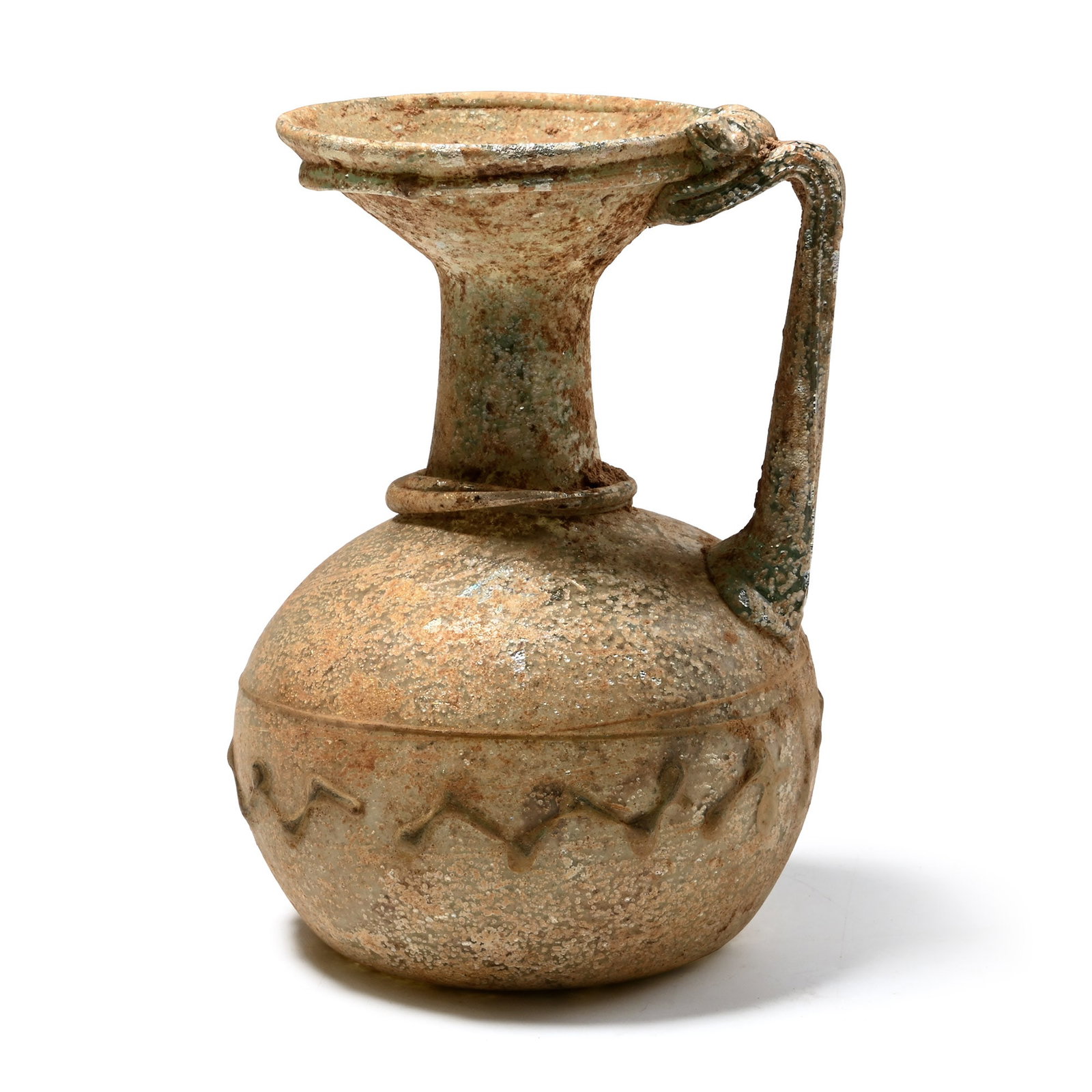 Roman Iridescent Glass Pitcher with Trail: 3rd-4th century A.D. Bulbous body with an applied zig-zag trail and a circumferential band above, and an applied collar at the base of the tubular neck and another beneath the flaring mouth, with a st