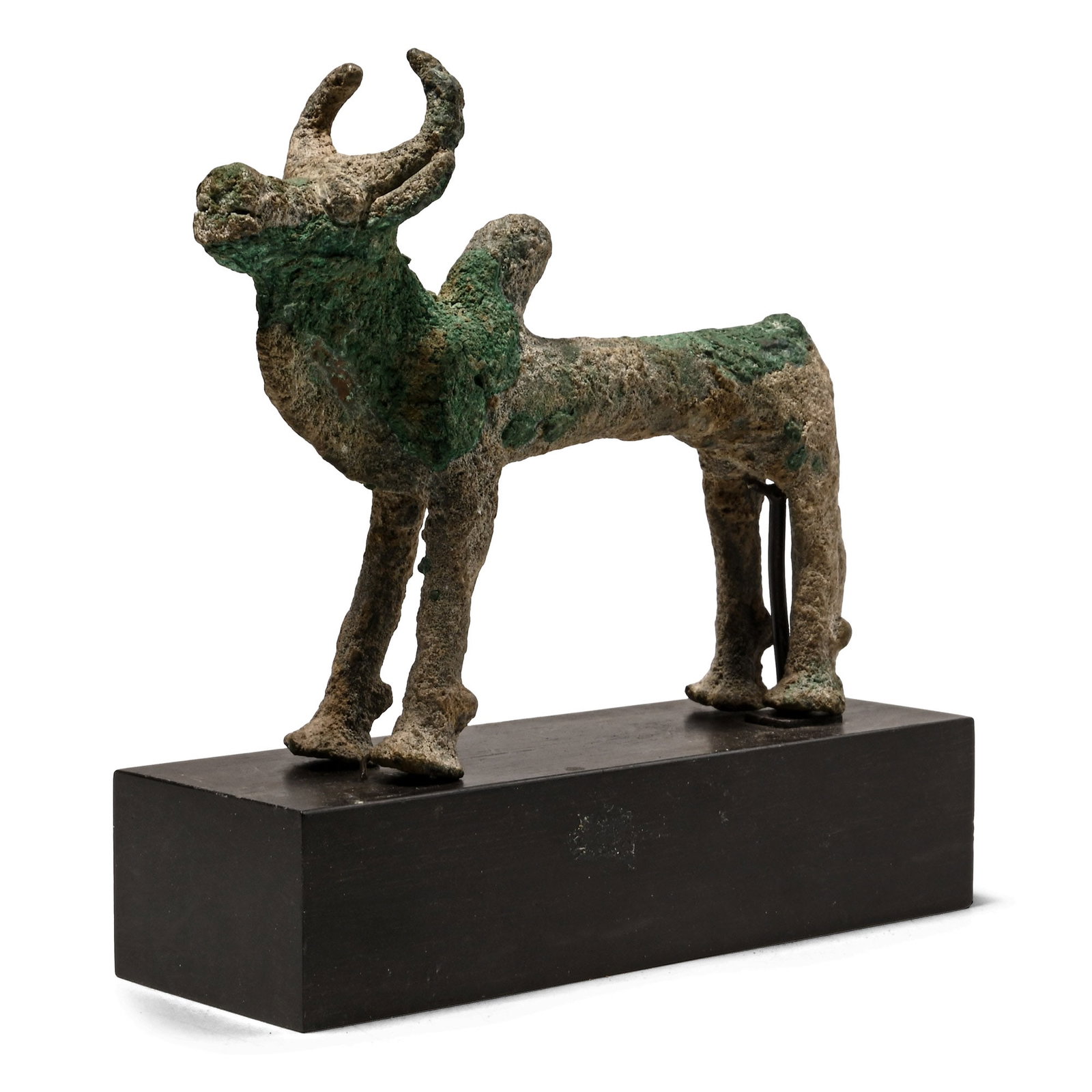 Bactrian Copper Standing Zebu: 3rd-2nd millennium B.C. Standing with head raised, dewlap to the chin and chest, angled hump behind the shoulders; mounted on a custom-made stand. 215 grams, 11.1 cm wide (351 grams total, 11.7 cm inc