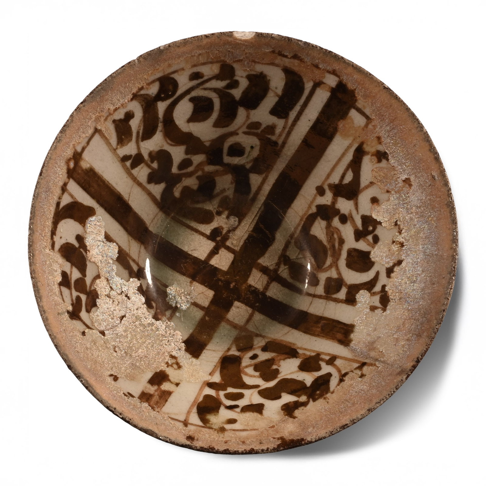 Syrian Lustre Pottery Bowl: 13th century A.D. Conical in profile with ring foot; glazed inner face with reserved cross and panels of calligraphic text; text to underside inside foot; old collectors' labels to sidewall. 142 grams