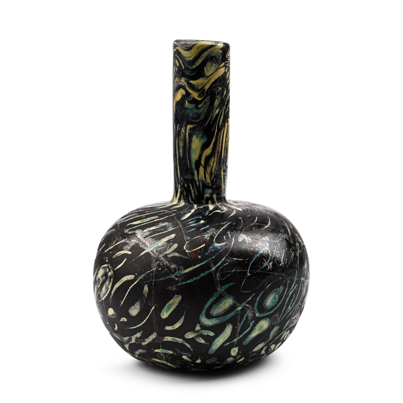 Fatimid Opaque Mosaic Glass Vase: Circa 10th-12th century A.D. or later. Comprising a squat, rounded body and tubular neck with a rounded rim, pontil base; dragged swirl motifs in white on a navy blue field; repaired. Cf. for similar 