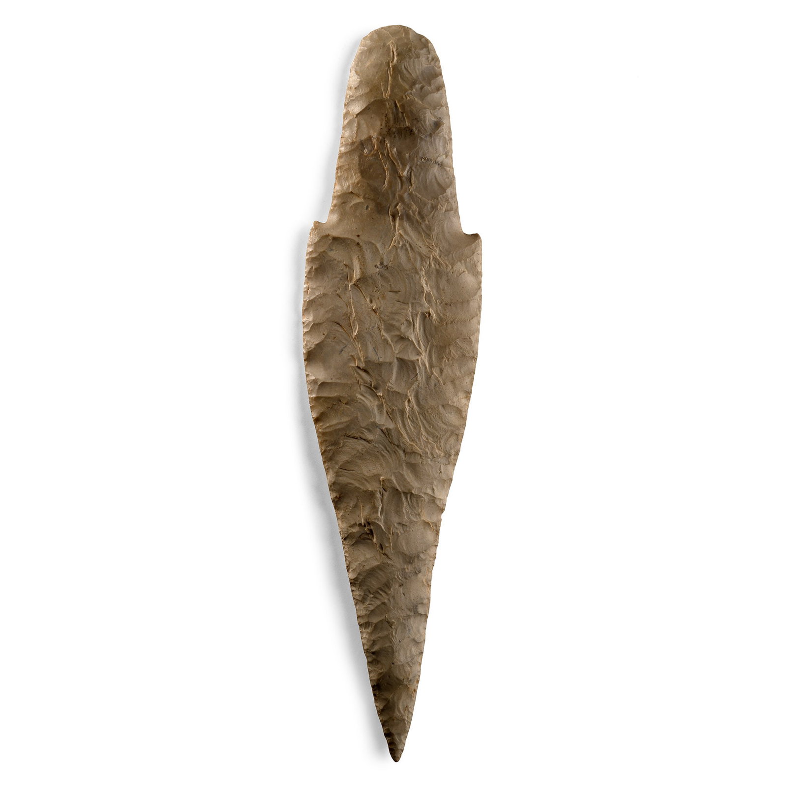 Massive North American Stone Age Knapped Grey Chert Ceremonial Adena Spear Point: Early Woodland Period, circa 2500-1900 B.P. With yellow patina and some polished areas, a ceremonial blade of exceptional length, fashioned from high-quality chert with controlled percussion flaking a
