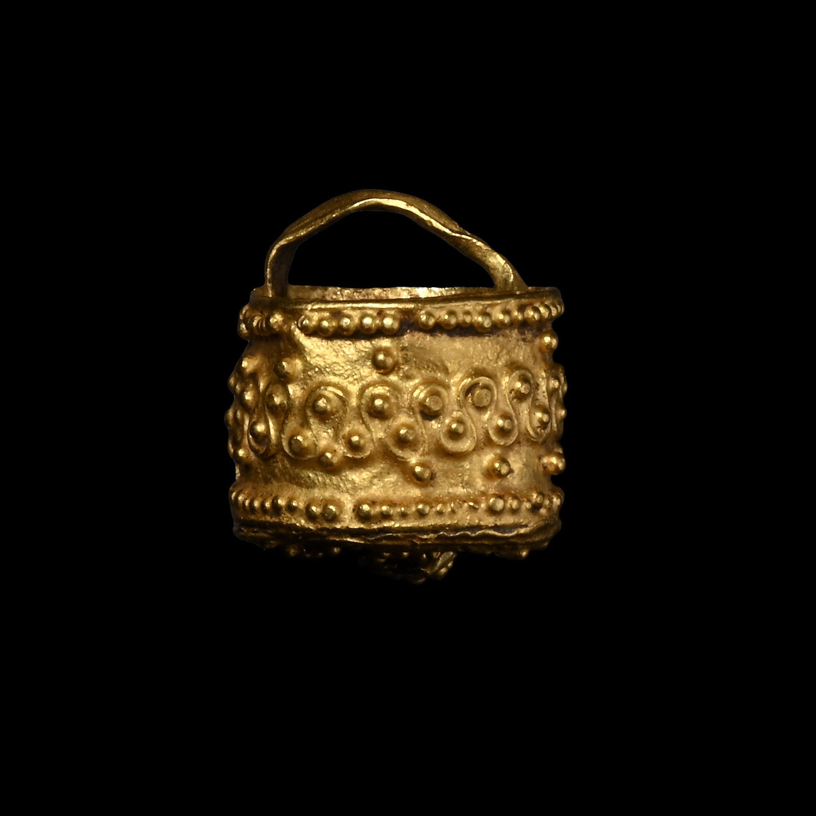 Pre-Viking Gold Aroma Bucket Pendant: Circa 4th-7th century A.D. Miniature drum-shaped vessel covered in a filigree meander pattern with granules and a strap handle. See Khrapunov, I. & Stylegar, F.A., Inter Ambo Maria, Contacts between S