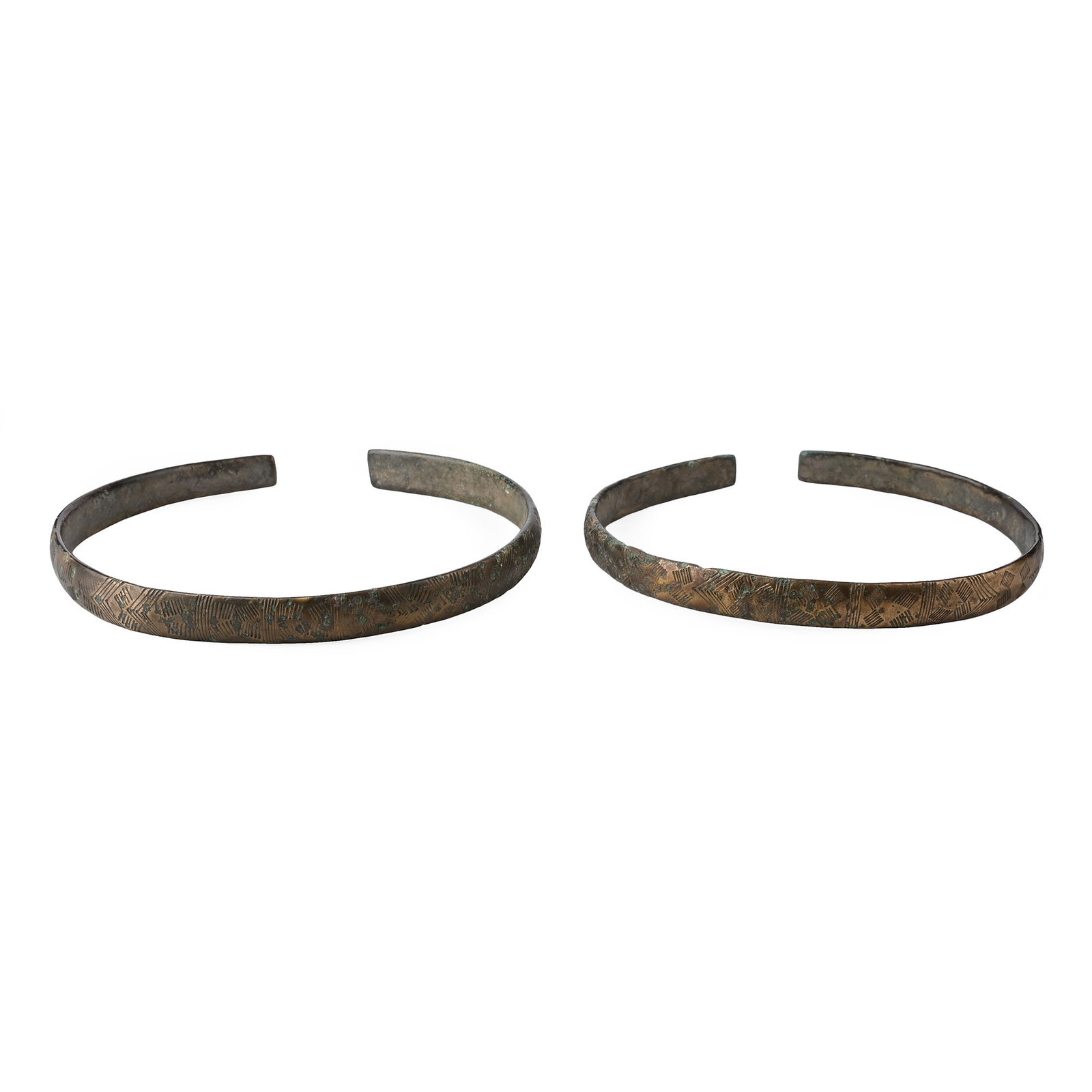 Viking Decorated Bronze Arm Ring Pair: 8th-9th century A.D. Matched pair of penannular arm bands with hatched decoration on the upper face. 154 grams total, 11.3-11.8 cm (4 1/2 - 4 5/8 in.). [2] From a 1980s collection. Ex North West Londo